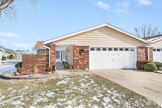 ranch-style home featuring a garage