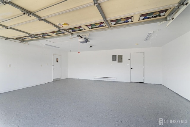 garage with electric panel, a garage door opener, and a baseboard heating unit