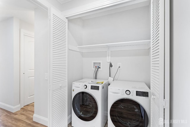 187 Newport Rd Unit A, Monroe, NJ 08831 - laundry area with light wood-type flooring, washing machine and dryer, and baseboards