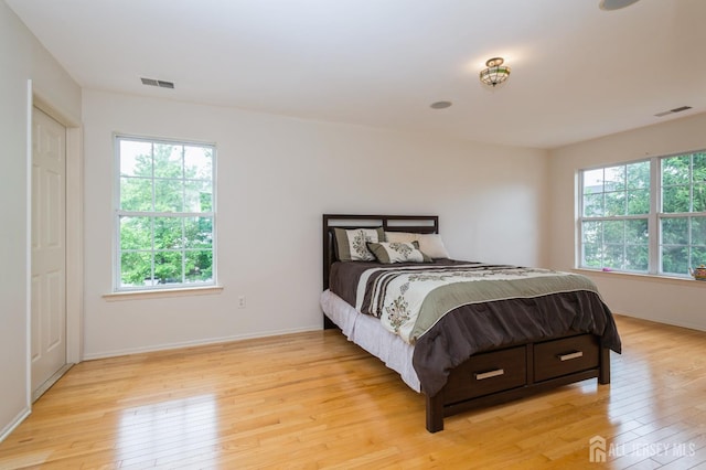 170 Vasser Dr, Piscataway, NJ 08854 - bedroom with light wood finished floors and baseboards