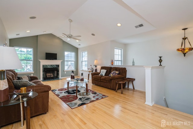 170 Vasser Dr, Piscataway, NJ 08854 - living area featuring plenty of natural light, light wood-type flooring, ceiling fan, a high end fireplace, and lofted ceiling