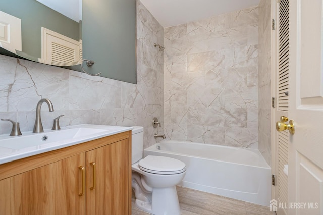 170 Vasser Dr, Piscataway, NJ 08854 - full bathroom with  shower combination, vanity, decorative backsplash, wood finished floors, and tile walls
