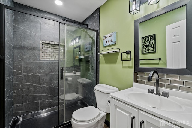 19 Lake Ave Unit 6A, East Brunswick, NJ 08816 - bathroom with vanity, a stall shower, and decorative backsplash