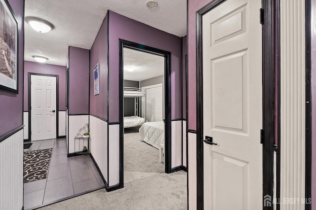 19 Lake Ave Unit 6A, East Brunswick, NJ 08816 - hall with a textured ceiling and light colored carpet
