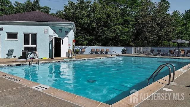 19 Lake Ave Unit 6A, East Brunswick, NJ 08816 - community pool with an outbuilding