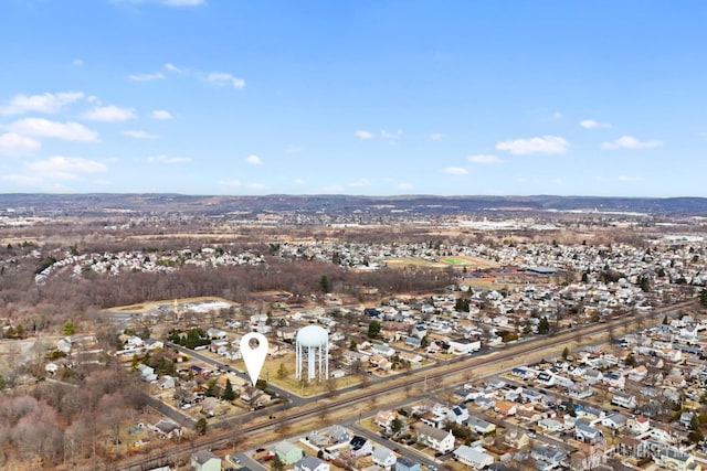 birds eye view of property with a residential view