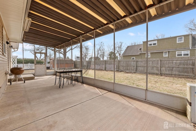 view of patio featuring a fenced backyard and outdoor dining area