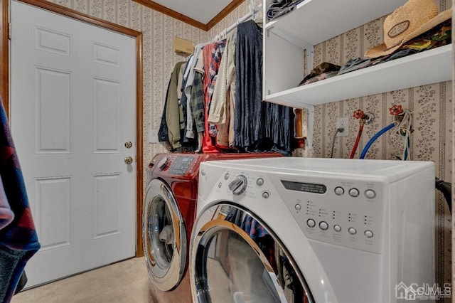 clothes washing area featuring separate washer and dryer, ornamental molding, and light tile patterned floors