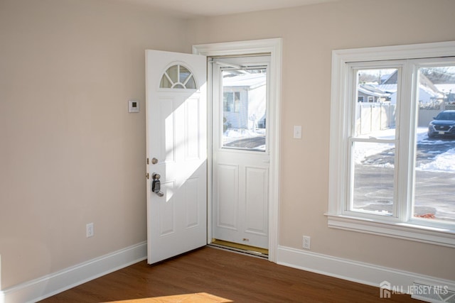 35 Red Bank Rd, Spotswood, NJ 08884 - foyer entrance featuring plenty of natural light and dark wood-style floors
