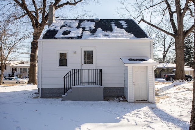 35 Red Bank Rd, Spotswood, NJ 08884 - snow covered house with a chimney