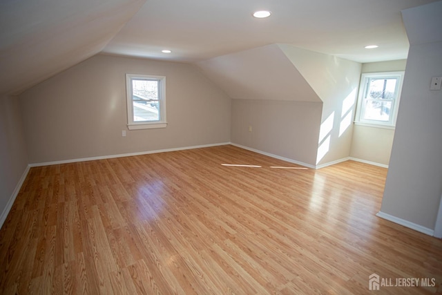 35 Red Bank Rd, Spotswood, NJ 08884 - additional living space with plenty of natural light, light wood-style flooring, lofted ceiling, and recessed lighting