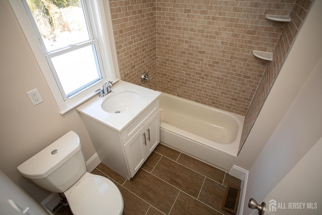 35 Red Bank Rd, Spotswood, NJ 08884 - bathroom with vanity, tile patterned flooring, and washtub / shower combination