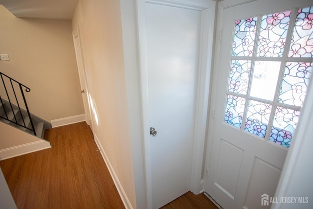35 Red Bank Rd, Spotswood, NJ 08884 - doorway to outside featuring wood finished floors and stairway