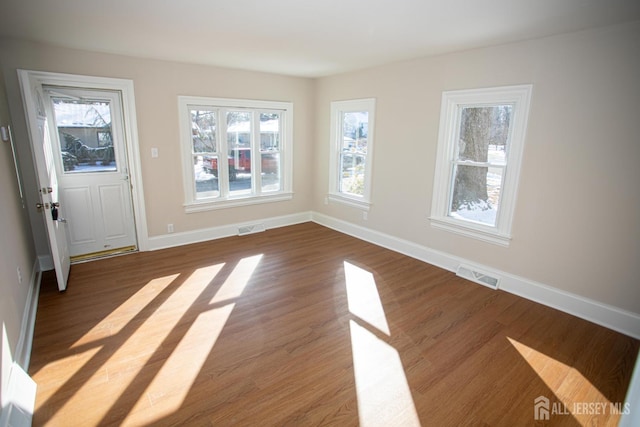 35 Red Bank Rd, Spotswood, NJ 08884 - entryway with healthy amount of natural light and wood finished floors