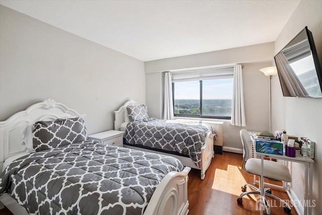 150 Overlook Ave Unit 15E, Hackensack, NJ 07601 - bedroom with wood finished floors and baseboards