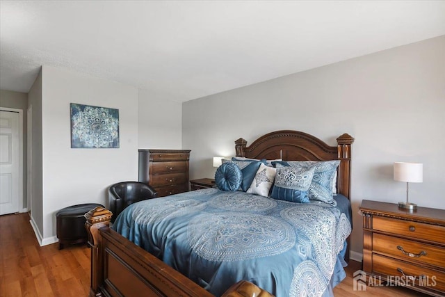 150 Overlook Ave Unit 15E, Hackensack, NJ 07601 - bedroom featuring wood finished floors and baseboards