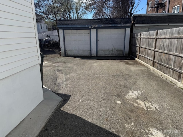 detached garage with fence