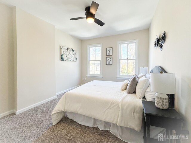 bedroom with carpet floors and ceiling fan