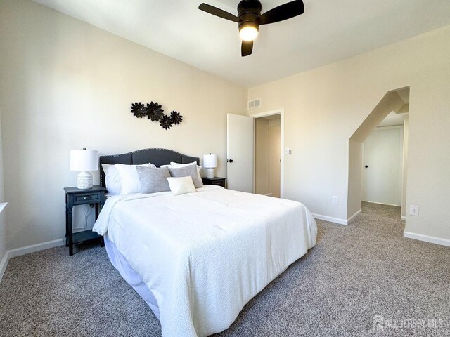 carpeted bedroom featuring ceiling fan