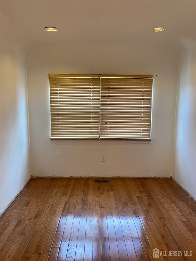 112 Beverly Hill Ter Unit H, Woodbridge Proper, NJ 07095 - unfurnished room with wood finished floors and recessed lighting