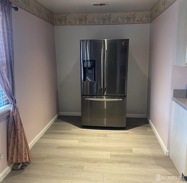 112 Beverly Hill Ter Unit H, Woodbridge Proper, NJ 07095 - kitchen with stainless steel fridge with ice dispenser and light wood finished floors