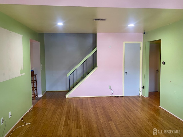 112 Beverly Hill Ter Unit H, Woodbridge Proper, NJ 07095 - unfurnished living room featuring stairs, hardwood / wood-style floors, and recessed lighting