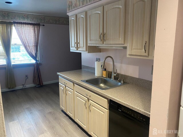 112 Beverly Hill Ter Unit H, Woodbridge Proper, NJ 07095 - kitchen featuring dishwasher, light wood finished floors, and light countertops