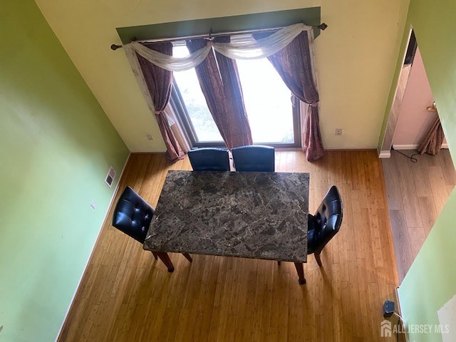 112 Beverly Hill Ter Unit H, Woodbridge Proper, NJ 07095 - dining room with baseboards and wood finished floors