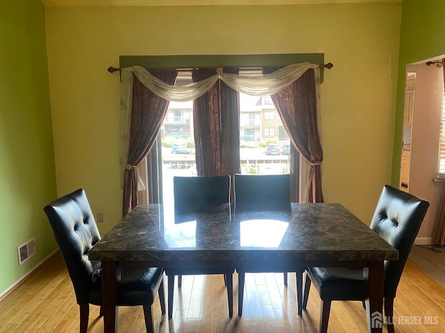 112 Beverly Hill Ter Unit H, Woodbridge Proper, NJ 07095 - dining space with light wood finished floors and baseboards