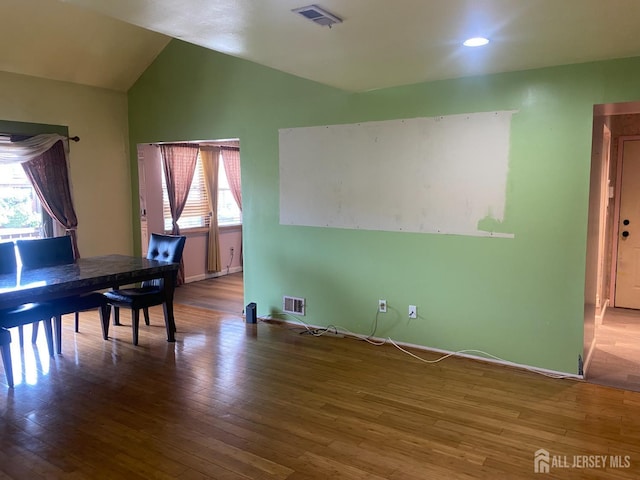 112 Beverly Hill Ter Unit H, Woodbridge Proper, NJ 07095 - dining space featuring plenty of natural light, wood finished floors, vaulted ceiling, and recessed lighting