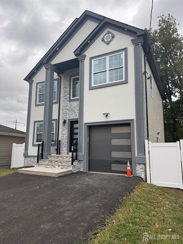 view of front of home with a garage