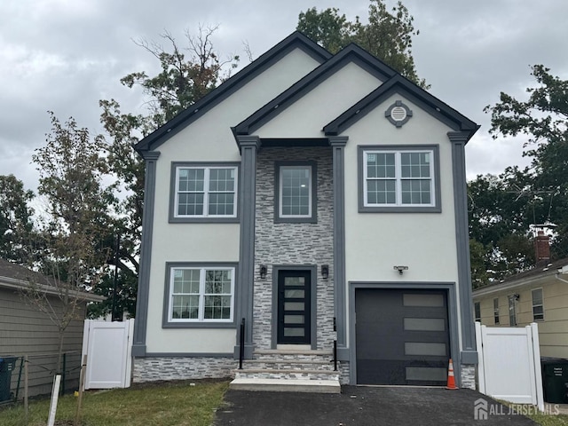 view of front of home featuring a garage