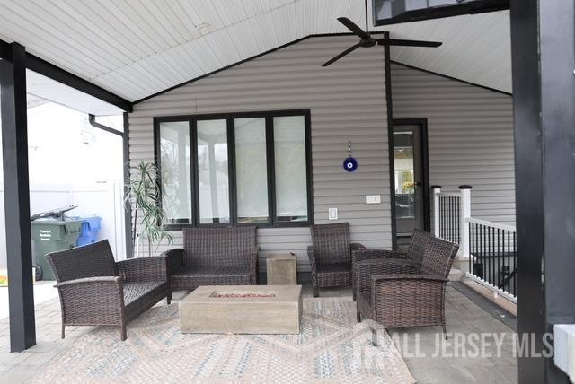 view of patio / terrace with an outdoor hangout area and ceiling fan