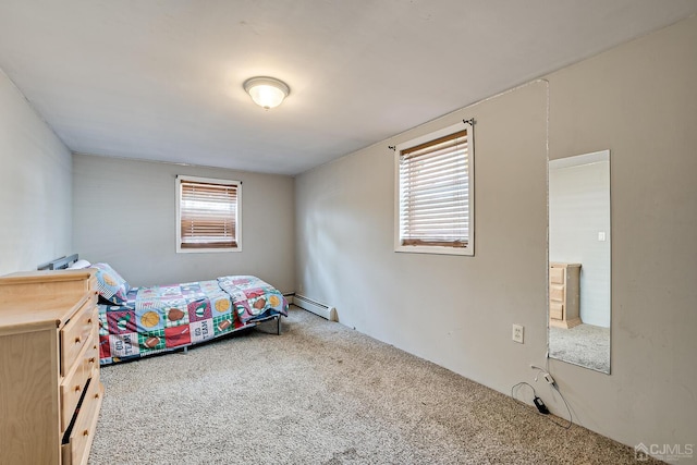 carpeted bedroom featuring a baseboard radiator