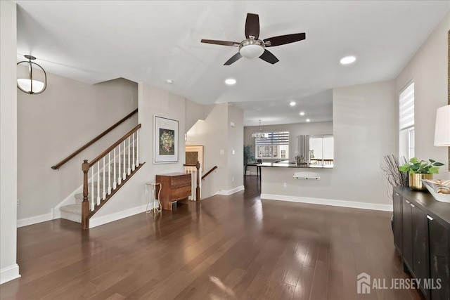 905 Chalmers Ln, Monroe, NJ 08831 - living area featuring dark wood finished floors, a ceiling fan, plenty of natural light, and recessed lighting