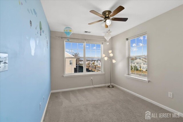 905 Chalmers Ln, Monroe, NJ 08831 - spare room featuring a ceiling fan and carpet flooring