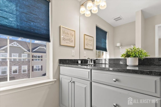 905 Chalmers Ln, Monroe, NJ 08831 - bathroom with vanity, healthy amount of natural light, and a chandelier