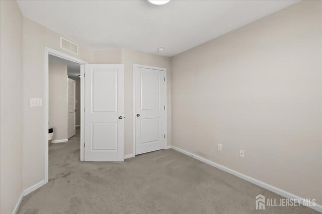 905 Chalmers Ln, Monroe, NJ 08831 - unfurnished bedroom with carpet floors and baseboards