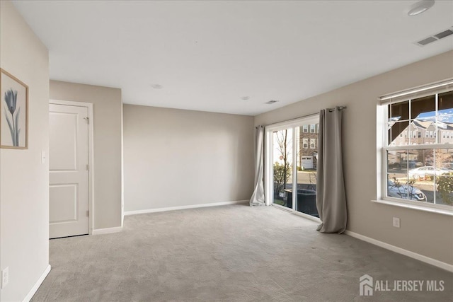 905 Chalmers Ln, Monroe, NJ 08831 - carpeted empty room with baseboards