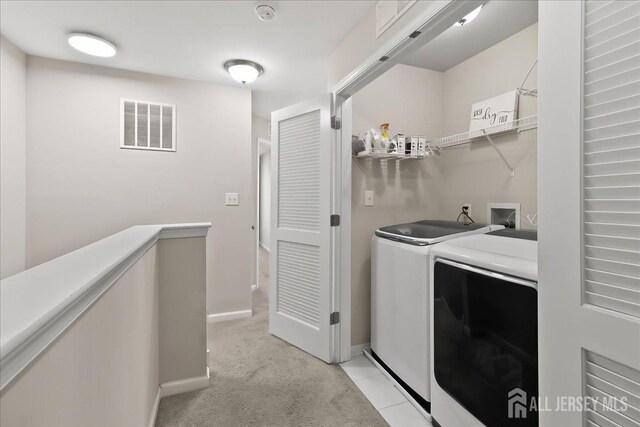 905 Chalmers Ln, Monroe, NJ 08831 - laundry room with independent washer and dryer and light carpet