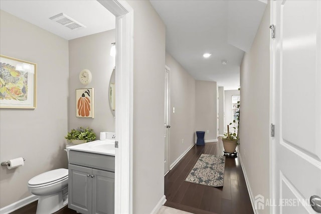 905 Chalmers Ln, Monroe, NJ 08831 - bathroom featuring vanity, wood finished floors, and recessed lighting