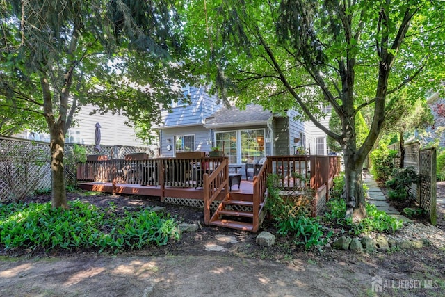97 Fairway Blvd, Monroe, NJ 08831 - rear view of property featuring a wooden deck
