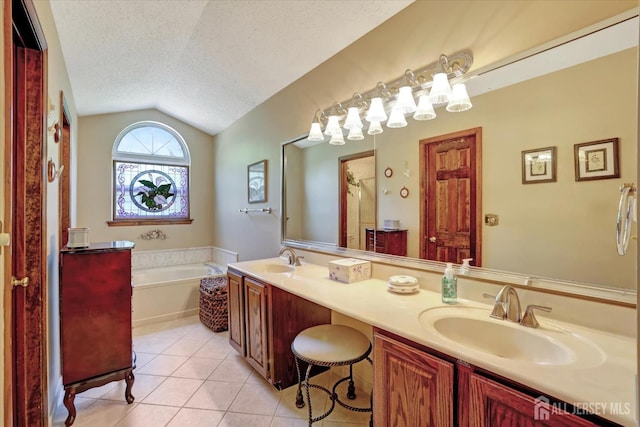 97 Fairway Blvd, Monroe, NJ 08831 - bathroom with lofted ceiling, tile patterned floors, a bath, double vanity, and a textured ceiling