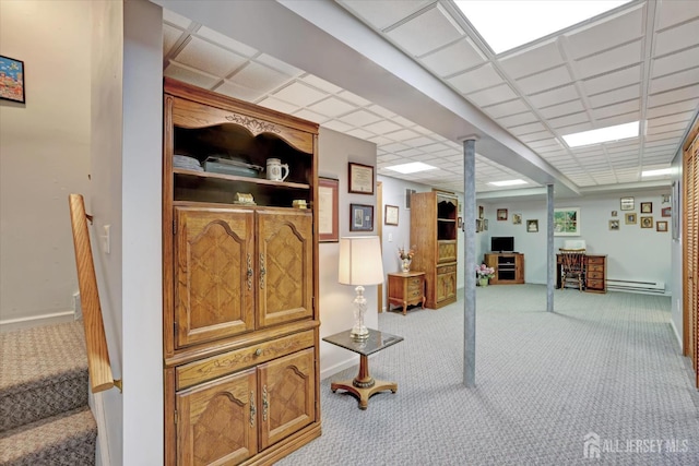 97 Fairway Blvd, Monroe, NJ 08831 - finished basement with carpet floors, a baseboard heating unit, and a drop ceiling