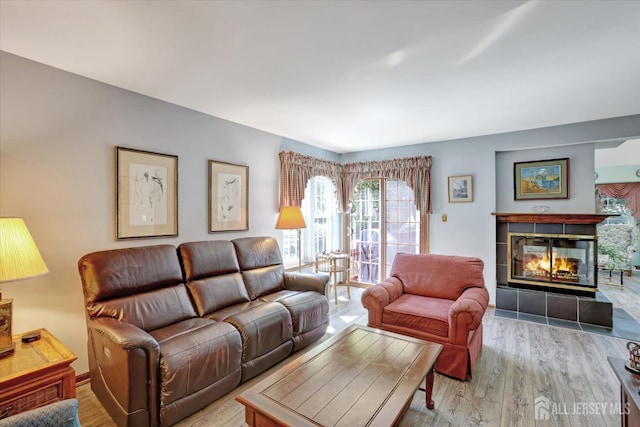 97 Fairway Blvd, Monroe, NJ 08831 - living area with wood finished floors and a fireplace