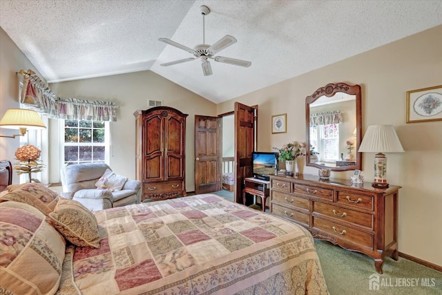 97 Fairway Blvd, Monroe, NJ 08831 - carpeted bedroom featuring multiple windows, vaulted ceiling, a textured ceiling, and ceiling fan