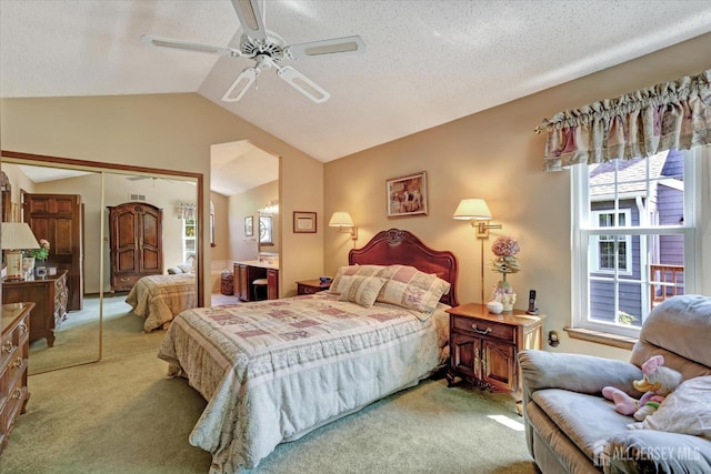 97 Fairway Blvd, Monroe, NJ 08831 - bedroom with carpet floors, a closet, lofted ceiling, a ceiling fan, and a textured ceiling