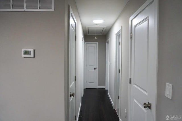 66 Willow Ave, Iselin, NJ 08830 - hallway with attic access, baseboards, and dark wood-type flooring
