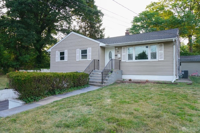 view of front of home featuring a front yard