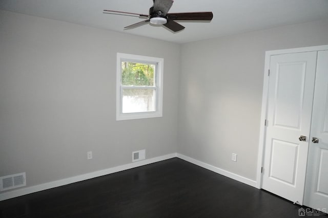 66 Willow Ave, Iselin, NJ 08830 - unfurnished room with a ceiling fan, dark wood-style floors, and baseboards
